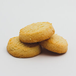 A picture of Simply The Best Shortbread. Three biscuits are stacked on a white background